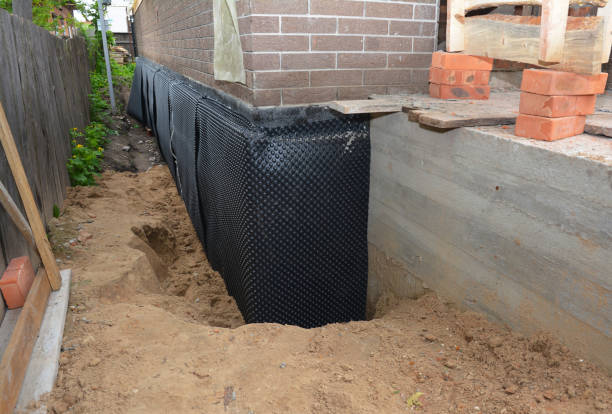 SJ Waterproofing Pros technician performing targeted Foundation Crack Repair assessment in Pelham, TN